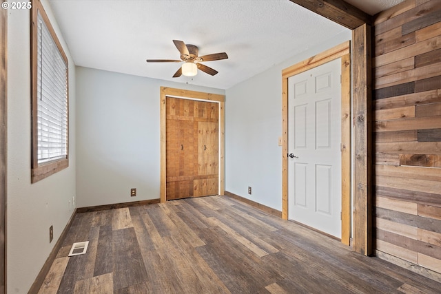 20694 SW Parker Ct, Beaverton, OR 97078 - unfurnished bedroom with wood finished floors, a closet, and ceiling fan