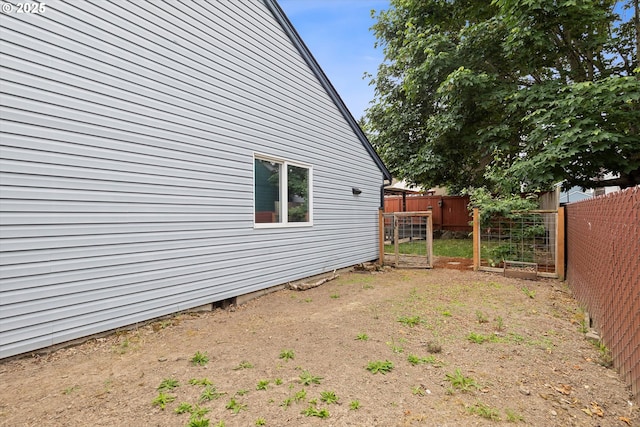 20694 SW Parker Ct, Beaverton, OR 97078 - view of yard with a vegetable garden