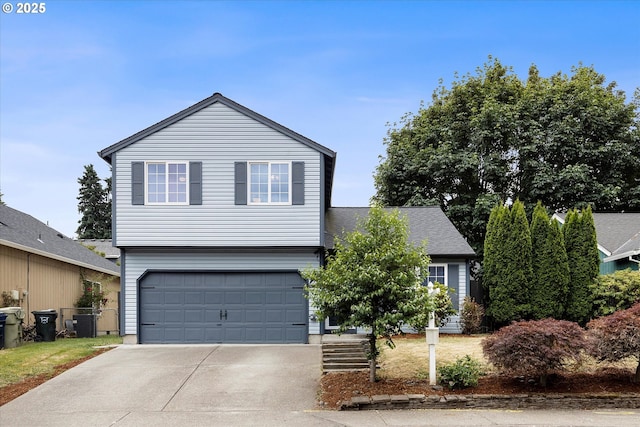 20694 SW Parker Ct, Beaverton, OR 97078 - view of front of house featuring an attached garage and concrete driveway