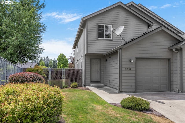 3617 Westleigh St, Eugene, OR 97405 - view of front of home with a garage and concrete driveway