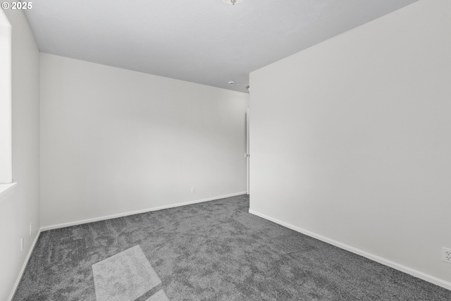 3617 Westleigh St, Eugene, OR 97405 - carpeted empty room with baseboards