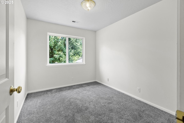 3617 Westleigh St, Eugene, OR 97405 - carpeted spare room featuring baseboards and a textured ceiling