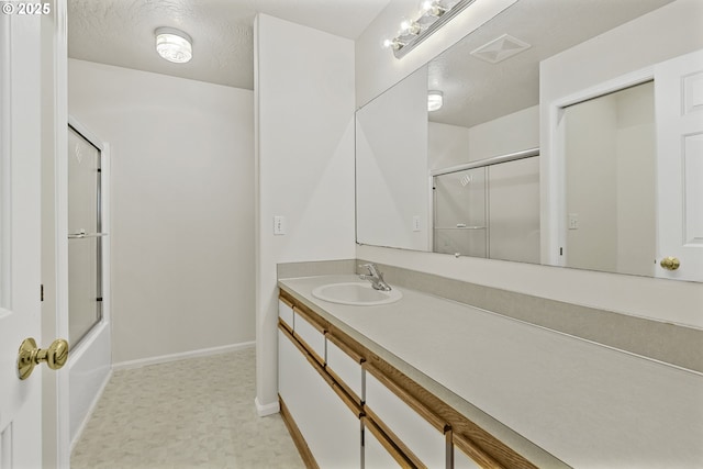 3617 Westleigh St, Eugene, OR 97405 - full bathroom featuring vanity, tile patterned floors, and combined bath / shower with glass door