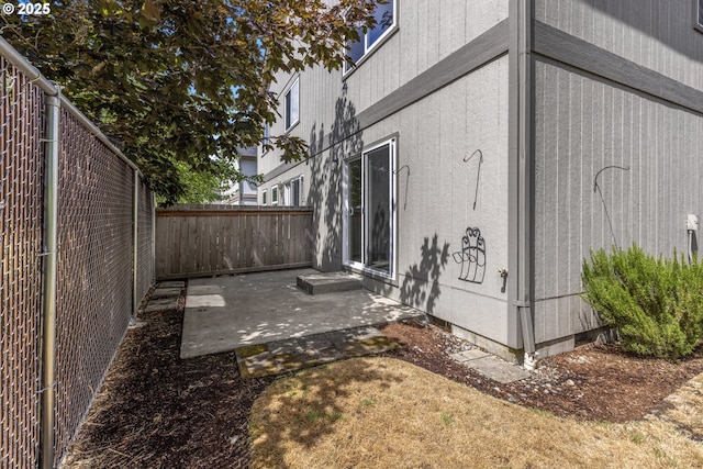 3617 Westleigh St, Eugene, OR 97405 - view of home's exterior with a fenced backyard and a patio area