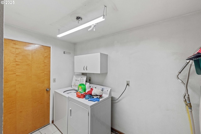 808 E 14th St, Coquille, OR 97423 - laundry room with washing machine and clothes dryer, cabinet space, and light tile patterned flooring