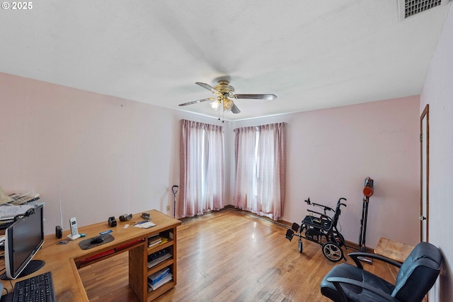 808 E 14th St, Coquille, OR 97423 - home office featuring a ceiling fan and light wood finished floors