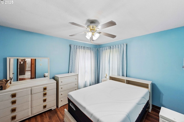 808 E 14th St, Coquille, OR 97423 - bedroom with dark wood-style floors and a ceiling fan