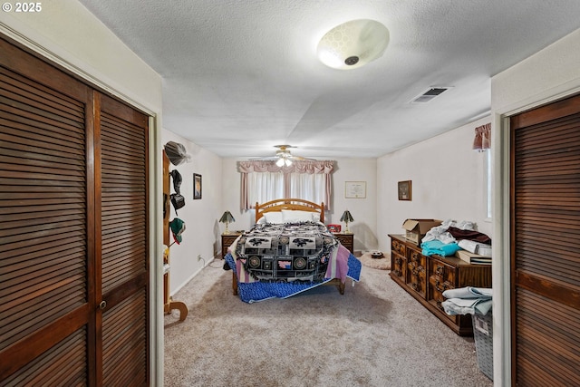 808 E 14th St, Coquille, OR 97423 - carpeted bedroom featuring a textured ceiling