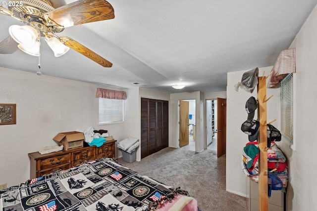 808 E 14th St, Coquille, OR 97423 - carpeted bedroom with a closet and a ceiling fan