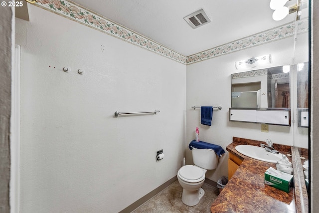 808 E 14th St, Coquille, OR 97423 - bathroom with toilet, vanity, baseboards, and a shower