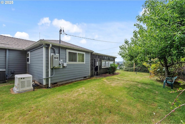 808 E 14th St, Coquille, OR 97423 - view of green lawn featuring central AC unit