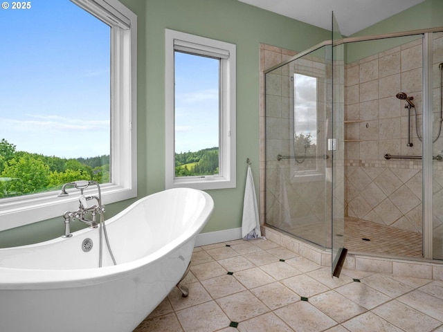 9320 NW Skyview Ct, Portland, OR 97231 - full bathroom with a shower stall, a freestanding tub, tile patterned flooring, and baseboards