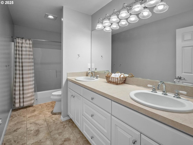 9320 NW Skyview Ct, Portland, OR 97231 - bathroom featuring toilet, double vanity, shower / bath combination with curtain, and tile patterned flooring
