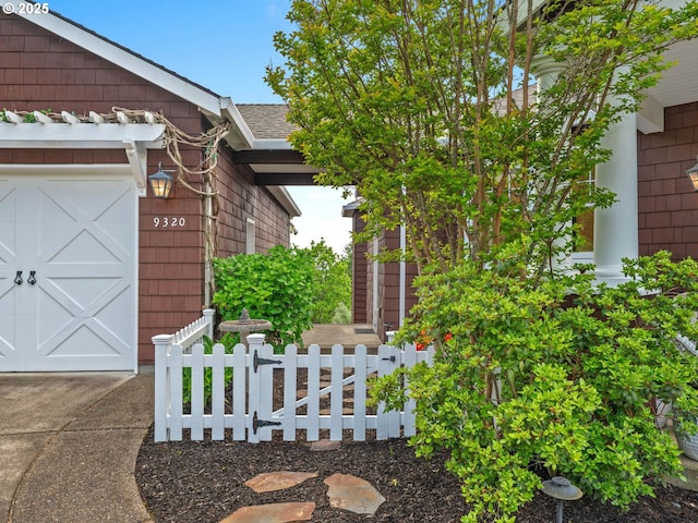 9320 NW Skyview Ct, Portland, OR 97231 - view of exterior entry featuring driveway