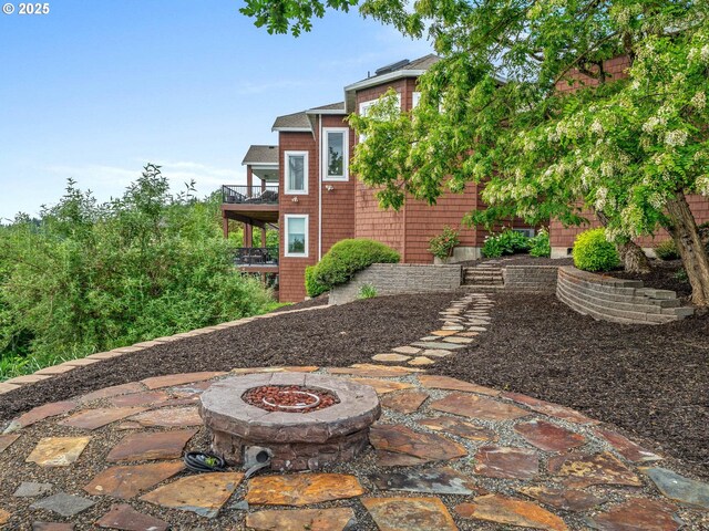 9320 NW Skyview Ct, Portland, OR 97231 - view of patio / terrace featuring a fire pit and a balcony