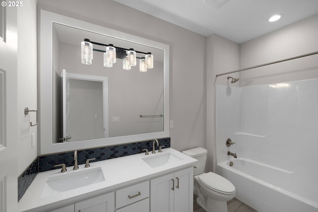 17716 NW Layla Dr Lot 28, Portland, OR 97229 - bathroom with toilet, double vanity, shower / tub combination, and recessed lighting