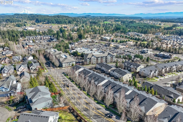 drone / aerial view featuring a mountain view and a residential view