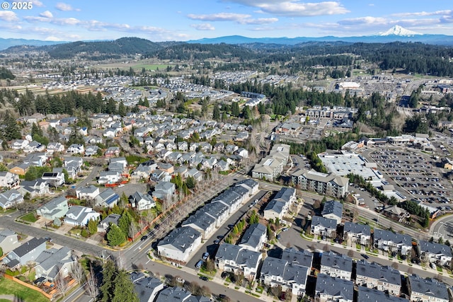 aerial view with a residential view and a mountain view