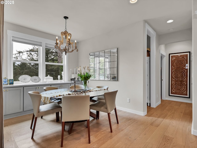 196 Dylan Ct, Gearhart, OR 97138 - dining area featuring a chandelier, light wood finished floors, plenty of natural light, baseboards, and recessed lighting