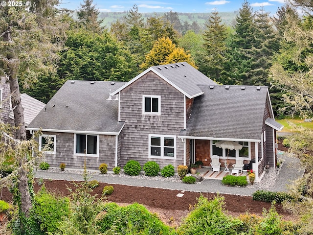 196 Dylan Ct, Gearhart, OR 97138 - rear view of property featuring a patio and a shingled roof