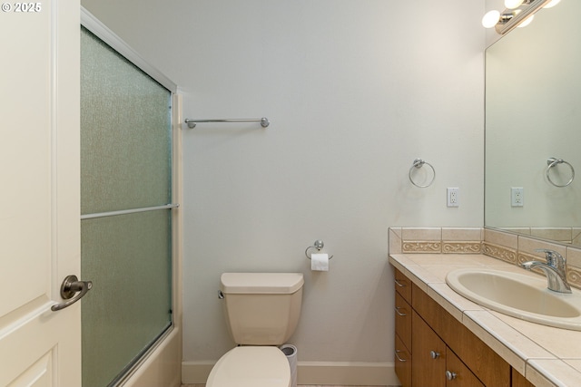 16215 SE Rivershore Dr, Vancouver, WA 98683 - full bath with vanity, toilet, shower / bath combination with glass door, and baseboards