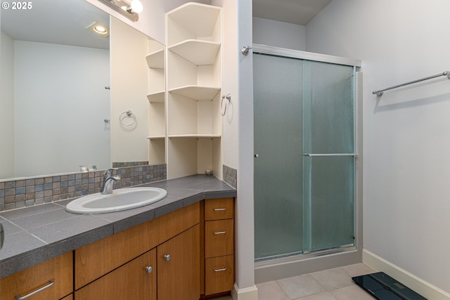 16215 SE Rivershore Dr, Vancouver, WA 98683 - bathroom with vanity, a shower stall, baseboards, and tile patterned floors
