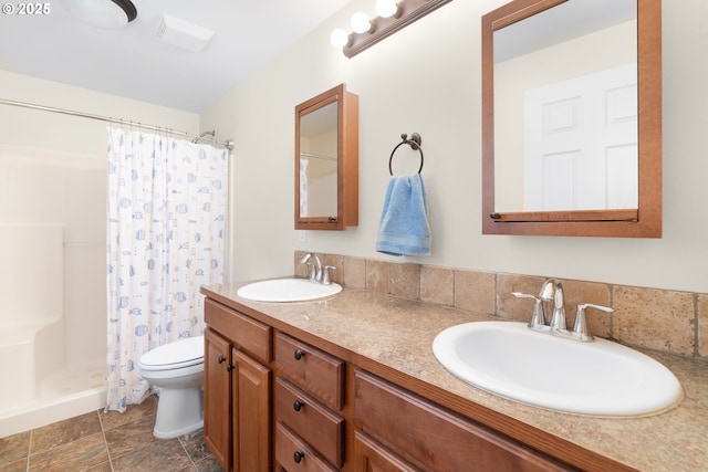full bath featuring toilet, a shower with shower curtain, and double vanity