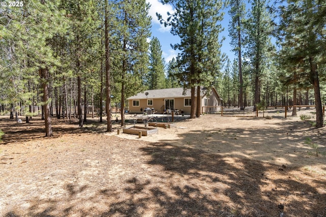 view of yard with fence and a patio area