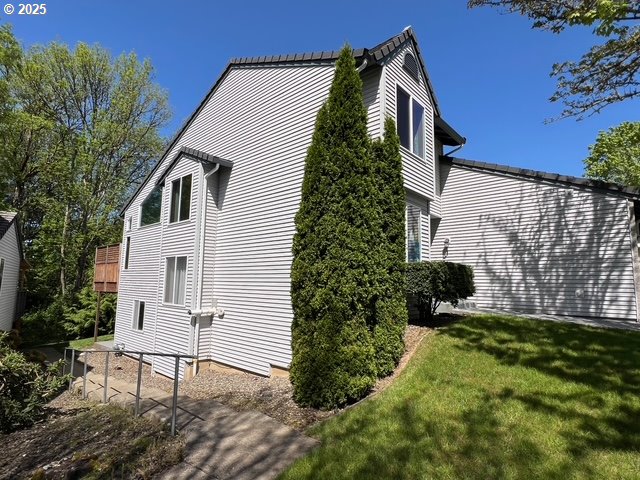 2217 NE 179th St Unit 22, Ridgefield, WA 98642 - view of home's exterior featuring a yard