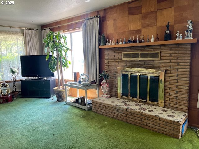 13727 SE Raymond St, Portland, OR 97236 - living area with carpet floors and a brick fireplace