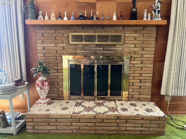 13727 SE Raymond St, Portland, OR 97236 - detailed view of carpet and a glass covered fireplace