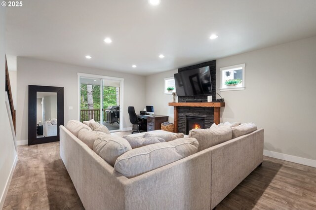 2188 SW Wallula Ln, Gresham, OR 97080 - living room with a stone fireplace, baseboards, recessed lighting, wood finished floors, and an office area