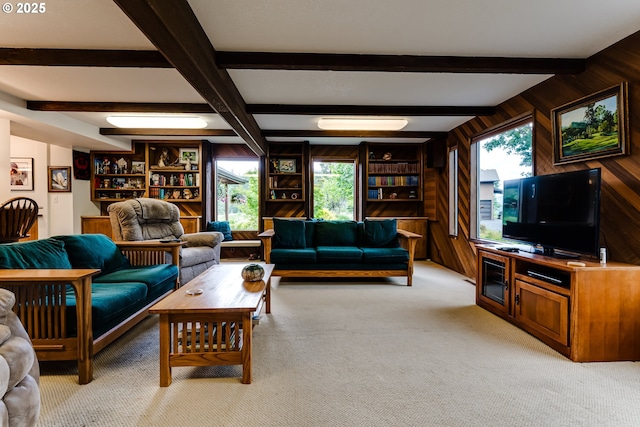 36910 Edgehill Rd, Springfield, OR 97478 - living area featuring wooden walls, beam ceiling, and light carpet