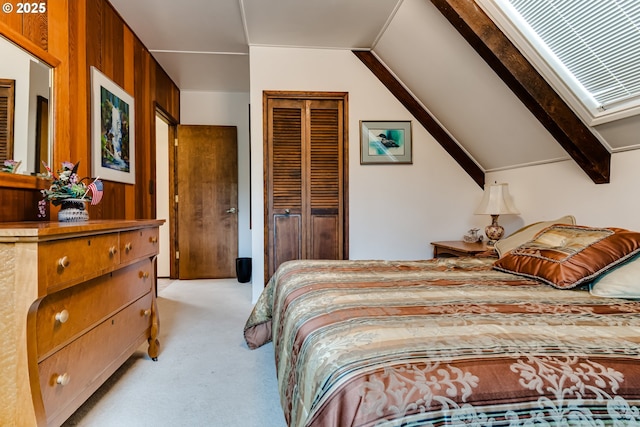 36910 Edgehill Rd, Springfield, OR 97478 - bedroom featuring light carpet, wood walls, a closet, and a skylight