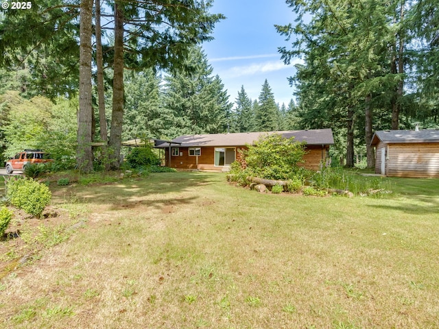 24873 S Beeson Rd, Beavercreek, OR 97004 - view of grassy yard featuring a storage unit