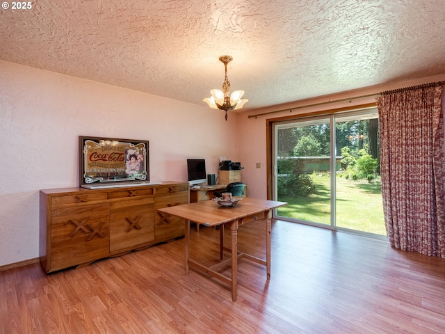 24873 S Beeson Rd, Beavercreek, OR 97004 - office space with a chandelier, light wood-type flooring, a textured ceiling, and a textured wall