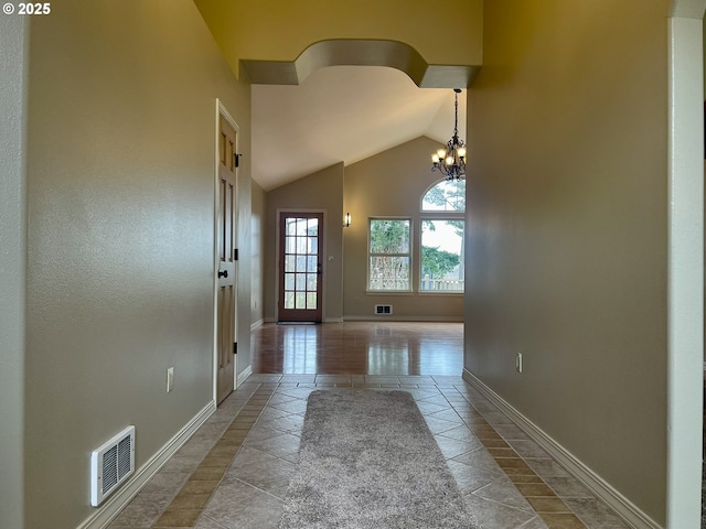 2180 Hayes St, North Bend, OR 97459 - hall with baseboards, a chandelier, and high vaulted ceiling