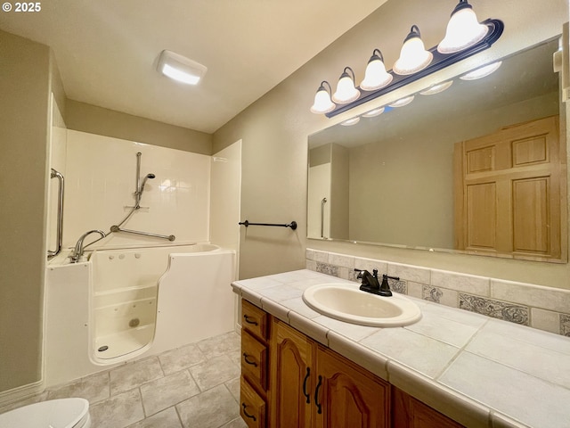 full bathroom with a bath and vanity