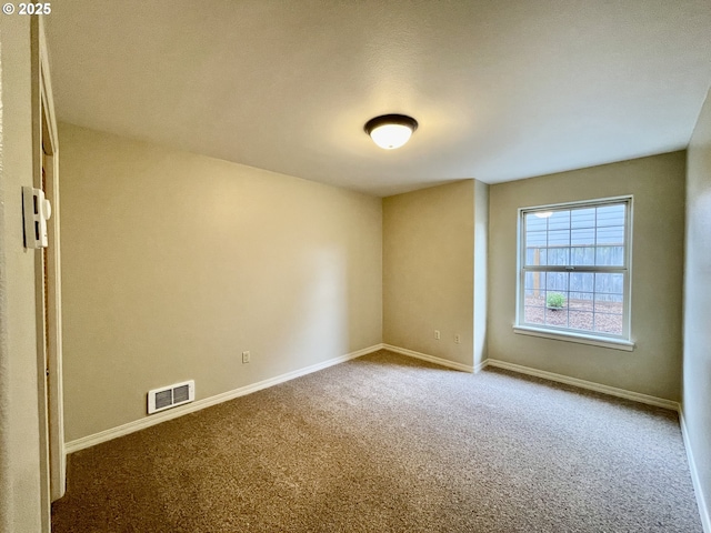 2180 Hayes St, North Bend, OR 97459 - spare room with carpet flooring and baseboards
