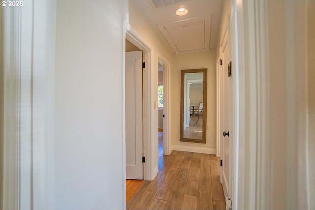 hallway featuring light hardwood / wood-style flooring