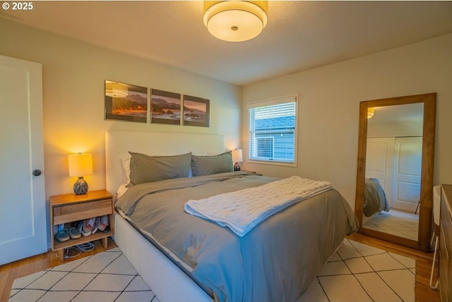 bedroom with light hardwood / wood-style flooring