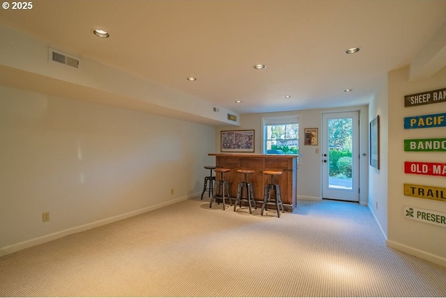 bar with light colored carpet