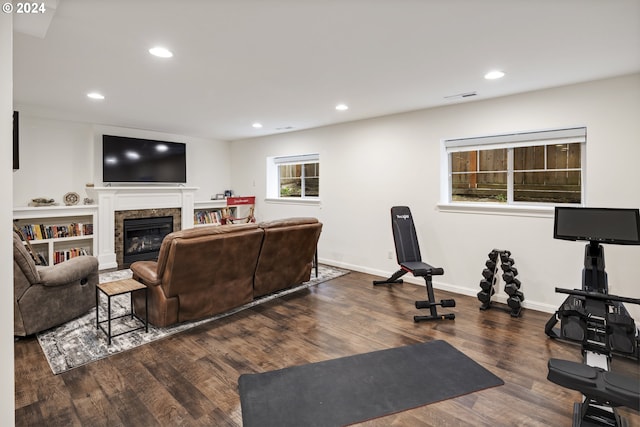 8235 SW 47th Ave, Portland, OR 97219 - exercise area with wood finished floors, recessed lighting, baseboards, and a high end fireplace