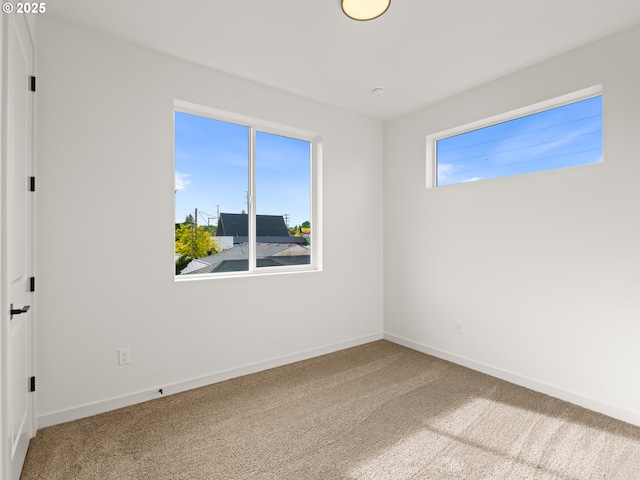 7582 N Alma Ave Unit 4, Portland, OR 97203 - spare room with carpet and baseboards