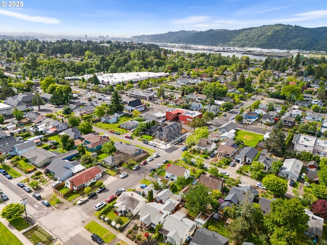 7582 N Alma Ave Unit 4, Portland, OR 97203 - aerial view of property's location featuring a water and mountain view and a heavily wooded area