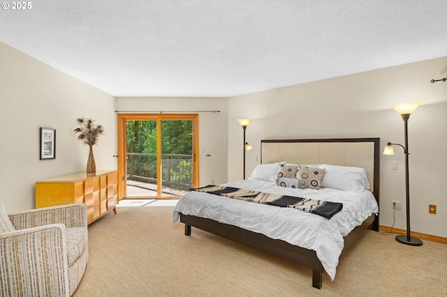 bedroom featuring carpet floors, access to outside, a textured ceiling, and baseboards