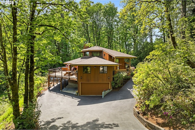 exterior space with an attached garage and driveway