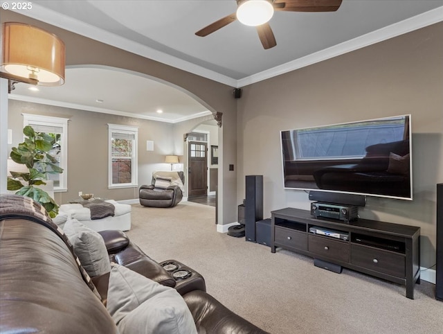 5610 NE Going St, Portland, OR 97218 - carpeted living area featuring ceiling fan, arched walkways, baseboards, and ornamental molding