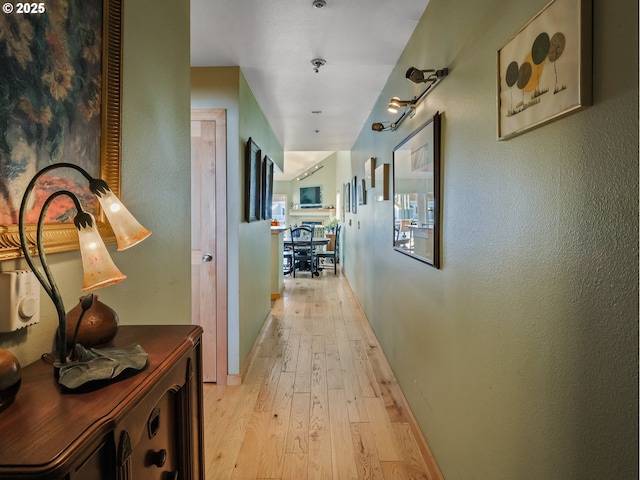 hallway featuring light hardwood / wood-style flooring