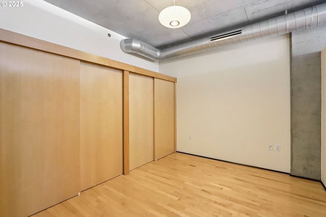 1410 NW Kearney St Unit 717, Portland, OR 97209 - below grade area with light wood-style flooring